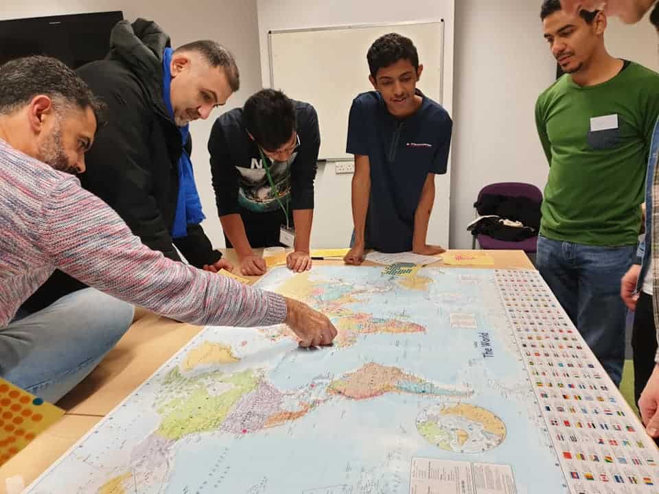 Group of people looking at map