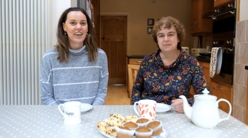 Screenshot of two women with baked goods